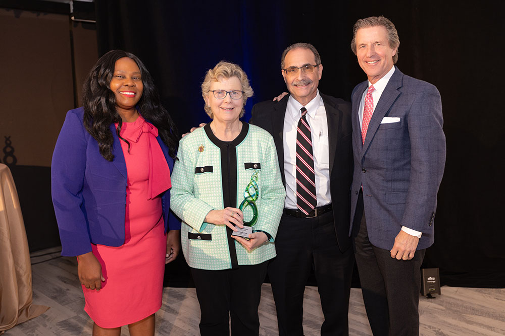 Marsha Shields accepting on behalf of the McCombs Family