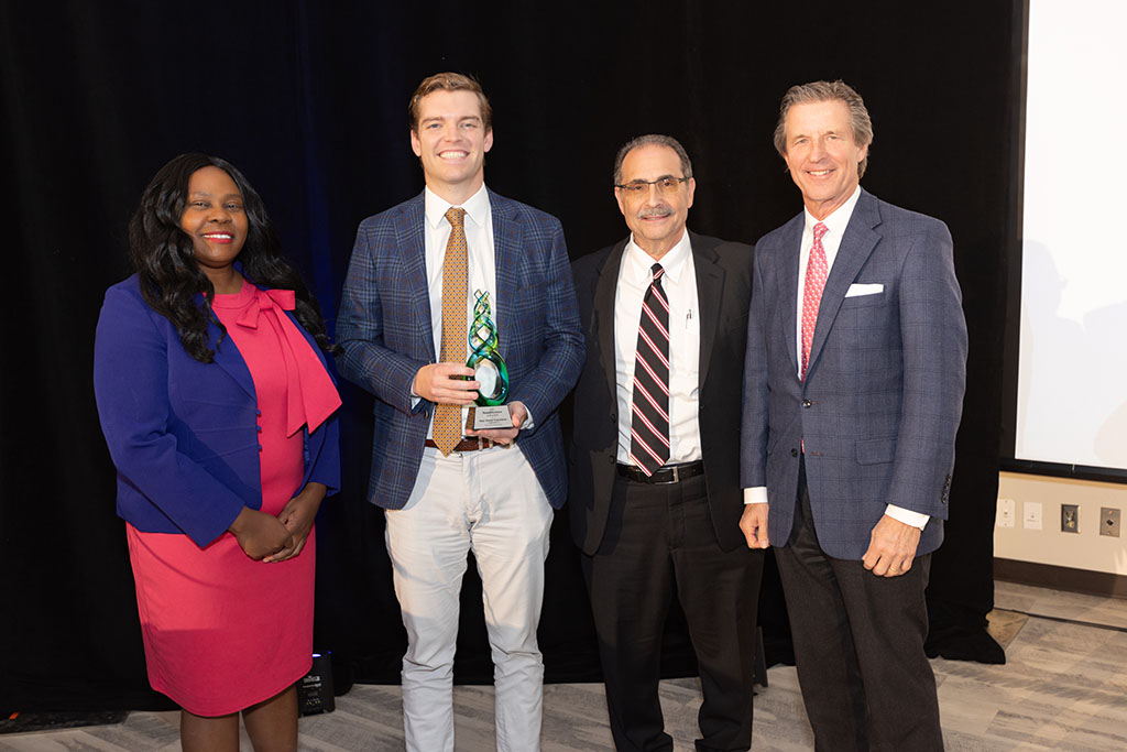 Patrick Mays, accepting on behalf of the Mays Family Foundation