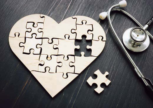 Stock Image of golden heart jigsaw puzzle
