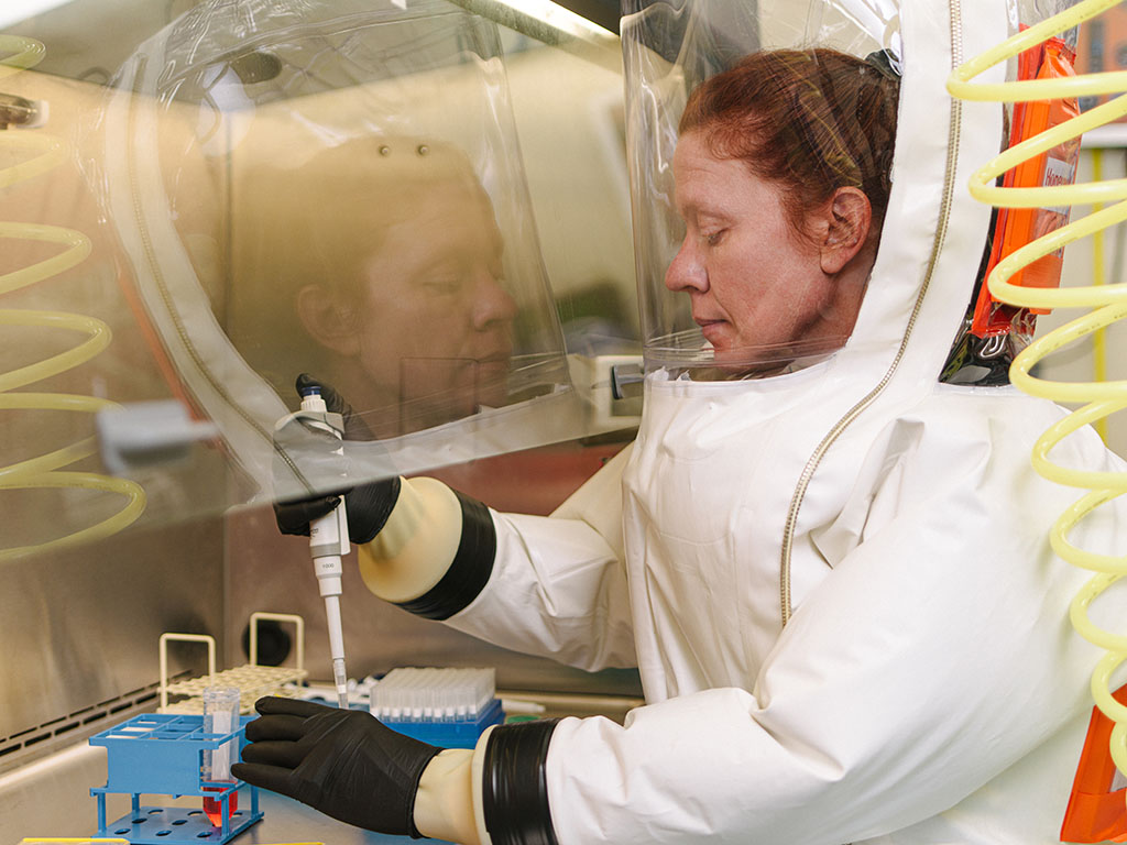 Veterinary research technician supervisor Laura Rumpf in the Texas Biomed BSL-4 lab.