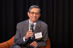 Dr. Vasan Ramachandran addresses guests during a panel discussion