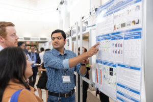 Susanta Pahari explaining poster