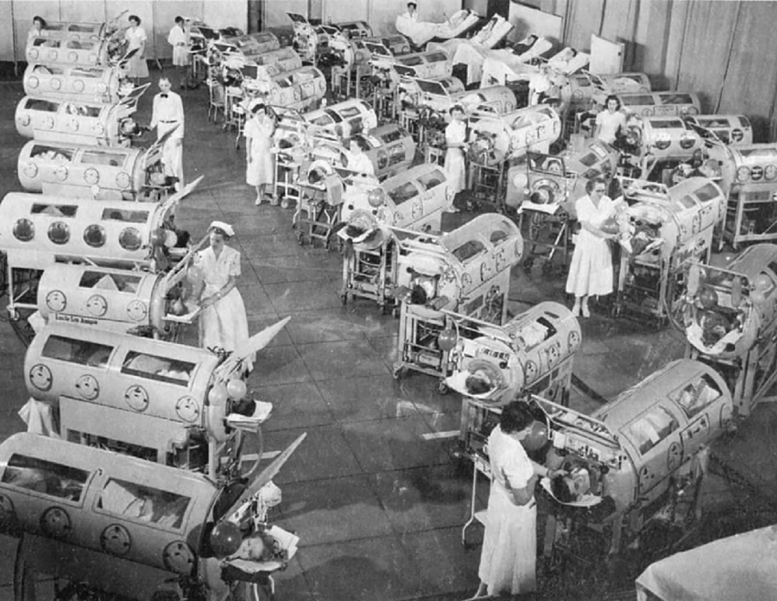 Black and white photo of children in iron lungs during polio outbreak