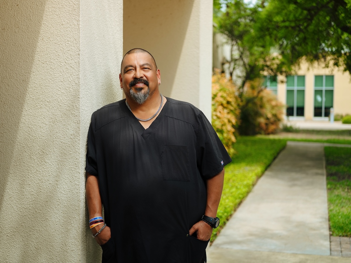 Image of George Villanueva smiling at the camera